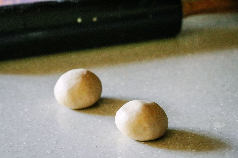 Balls formed of atta, the dough for Parathas