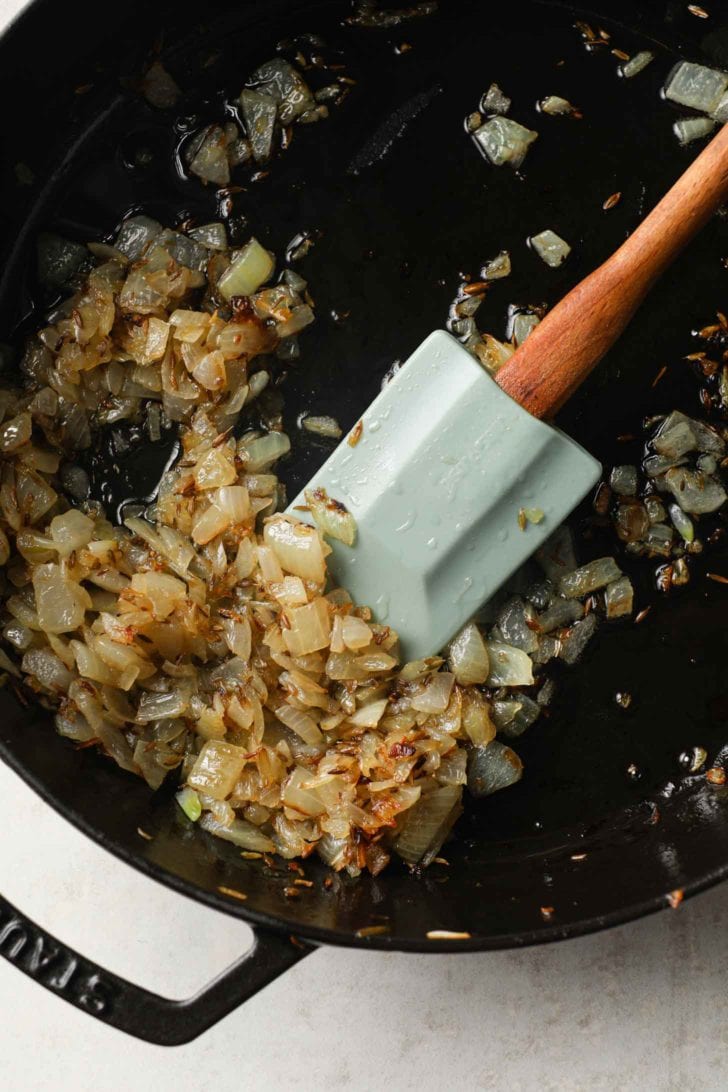 browned onions in a black skillet