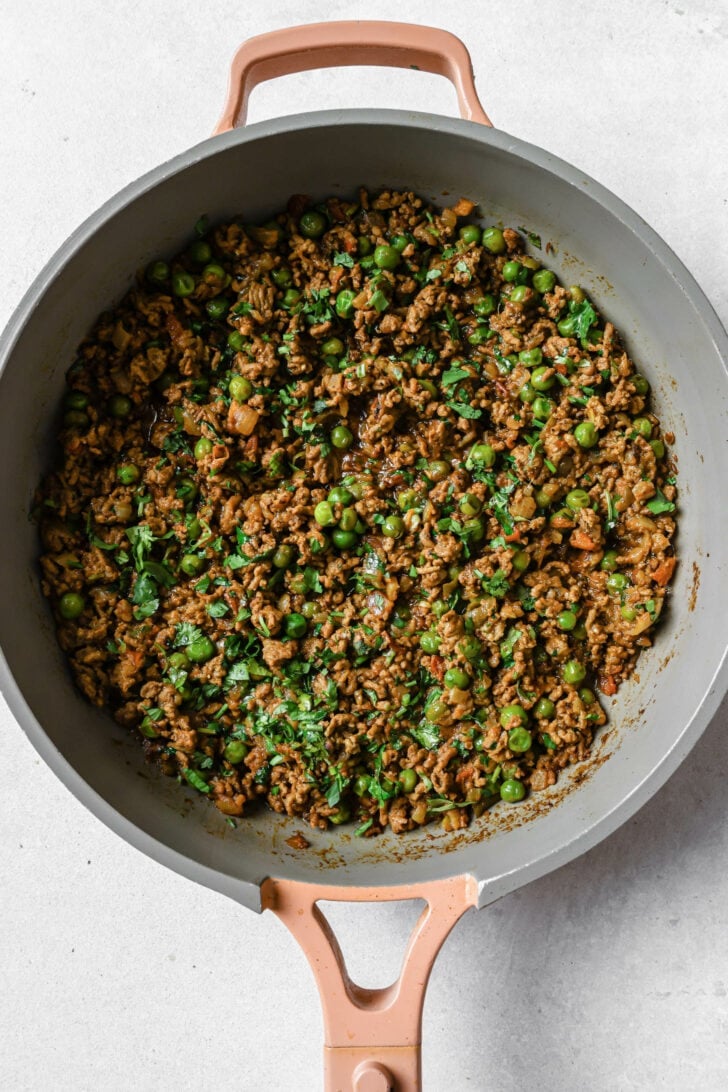 Keema Matar after being cooked, garnished with cilantro.