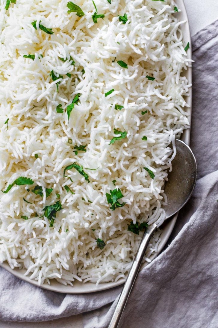 Basmati Rice in a platter with a silver spoon