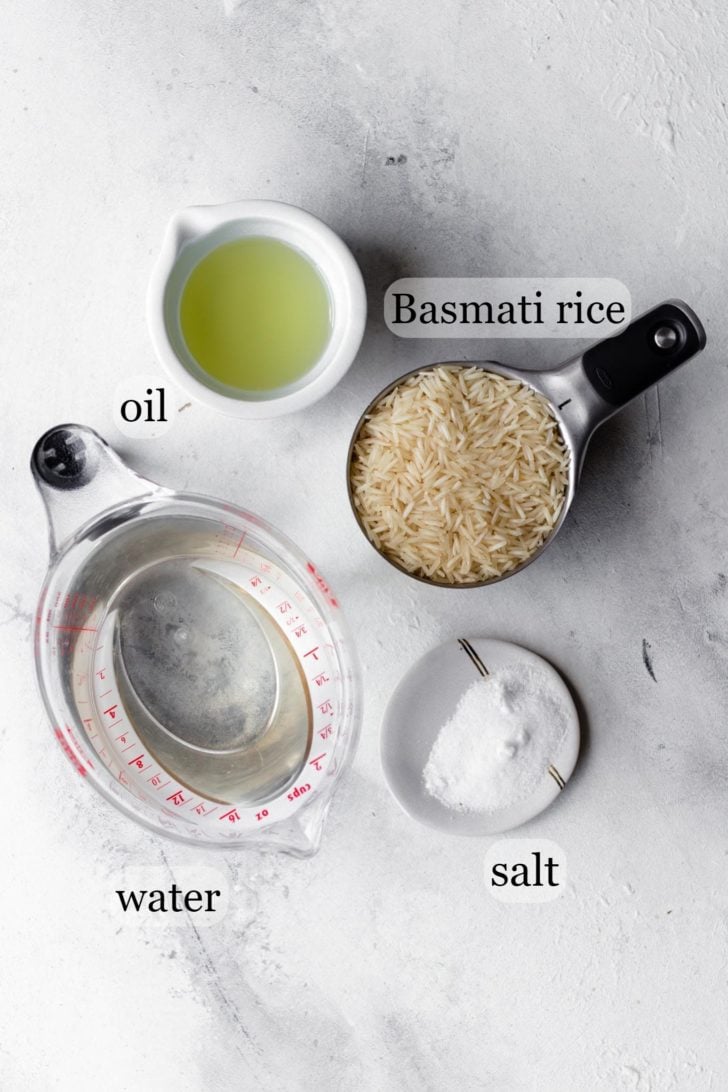Basmati rice, oil, salt and water to make basmati rice in a rice cooker
