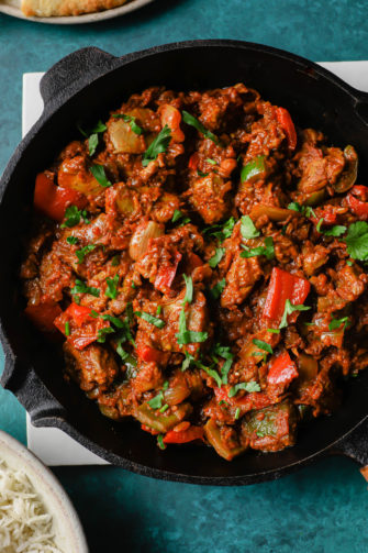 Cooked Chicken Jalfrezi in a black skillet
