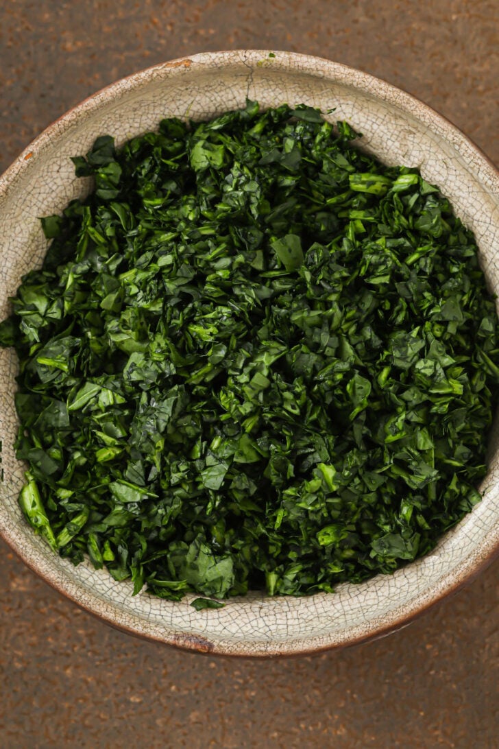 Chopped spinach in a bowl.