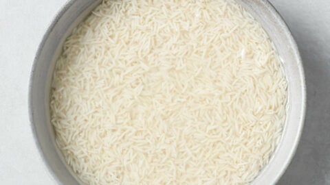 Soaking basmati rice in a bowl.