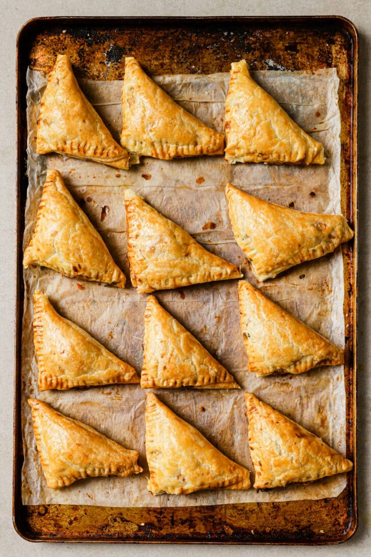 Baked Chicken Puff Pastries on a baking sheet.