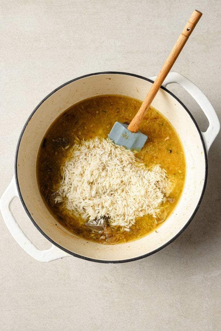 Rice added to broth.