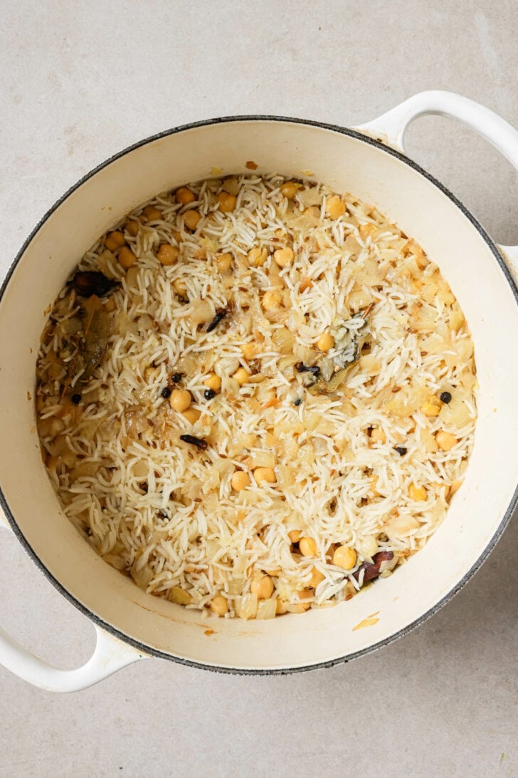 Cooked Chana Pulao in a Dutch Oven ready to be fluffed.