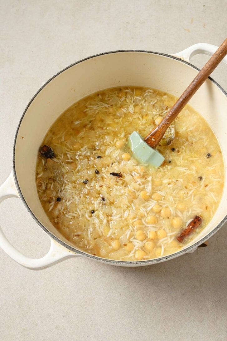 Rice added to Chana Pulao and ready to boil.
