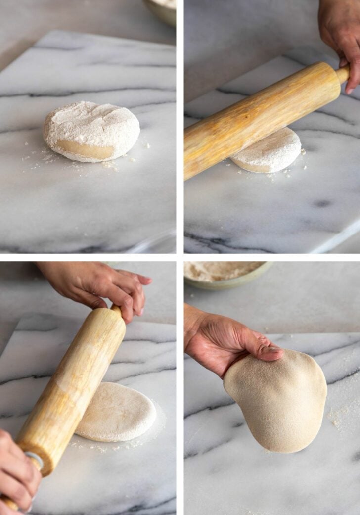 Rolling out dough ball to make paratha.